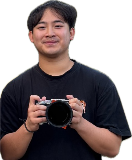Hao Bui holding a camera